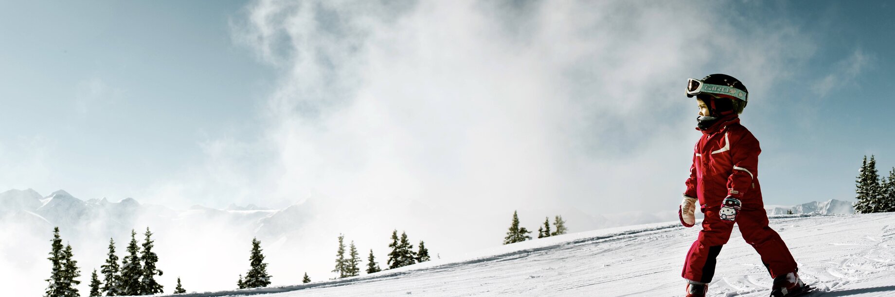 a person skiing on the snow