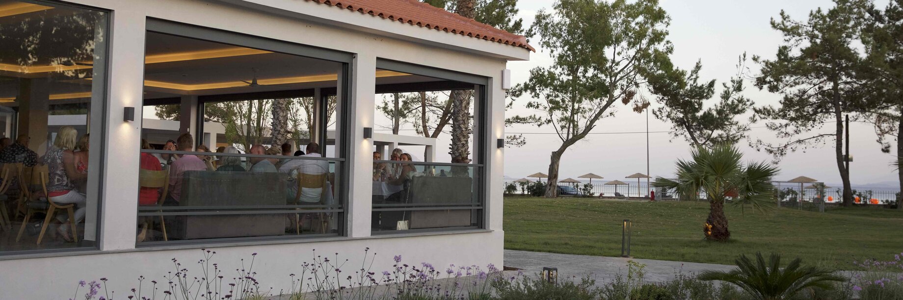 a house with a lawn and trees