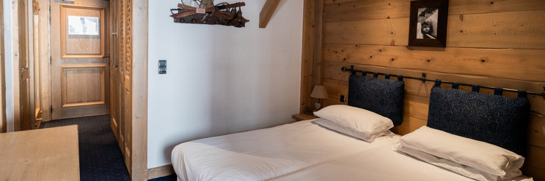 Twin beds at Chalet Hotel L'Ecrin