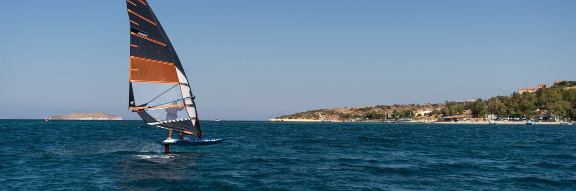 Windsurfer foiling at Phokaia Beach Resort, Turkey