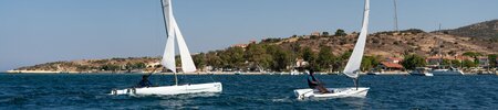 A catamaran and a dinghy sailing boat at Phokaia Beach Resort, Turkey