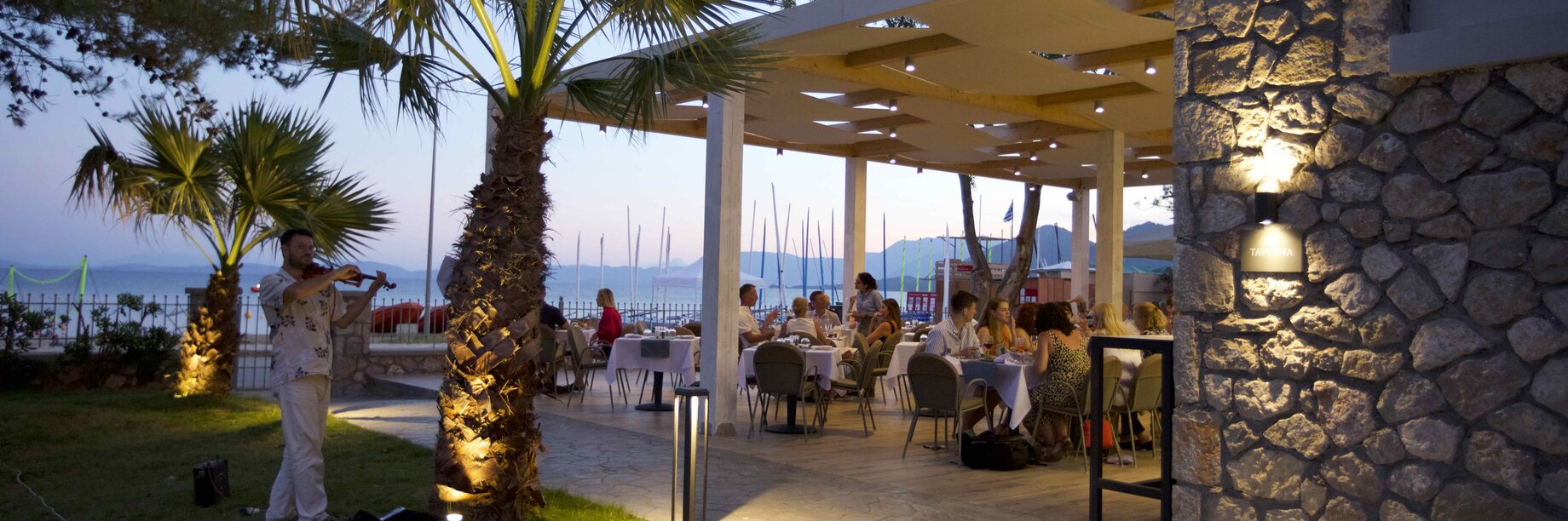 a group of people sitting at tables