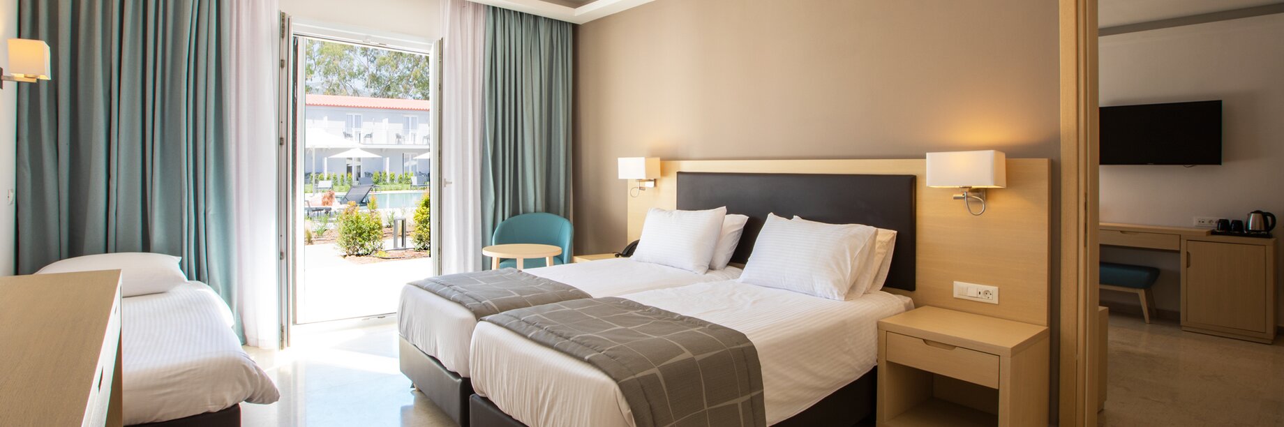 a hotel room with two beds