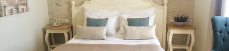 a bed with a blue blanket