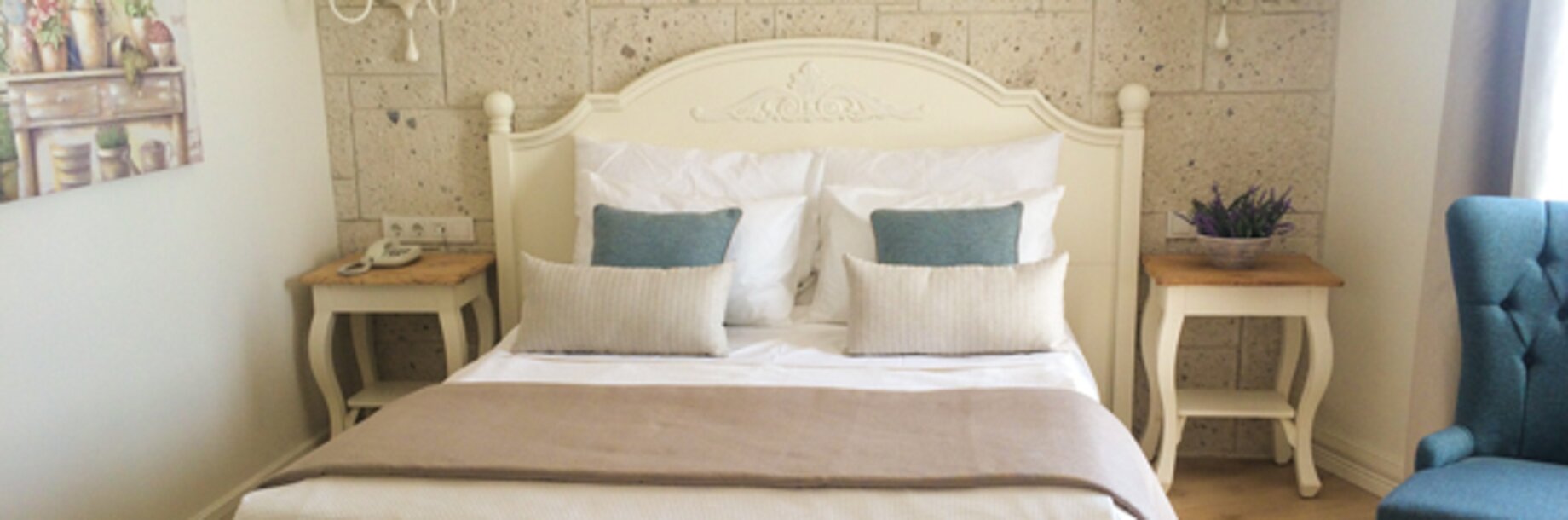 a bed with a blue blanket