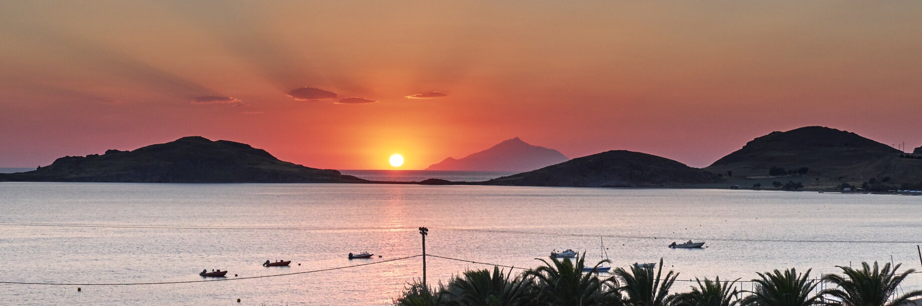 a sunset over a beach