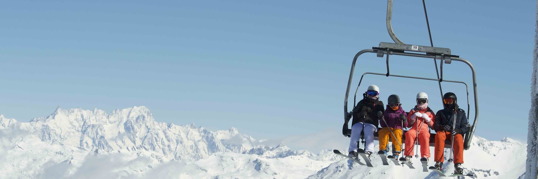 a group of people on a ski lift
