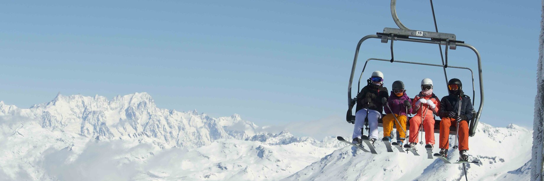 a group of people on a ski lift
