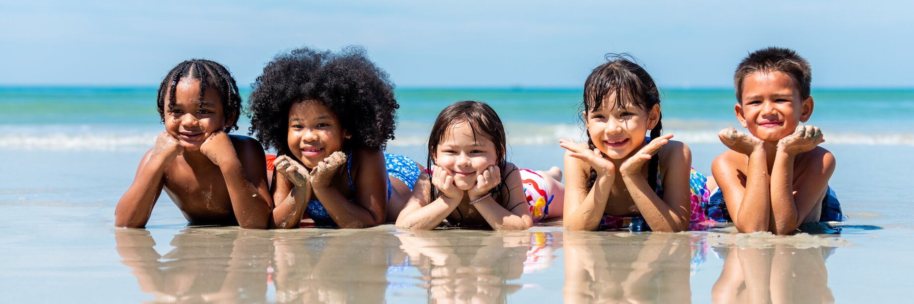 a group of children in the water